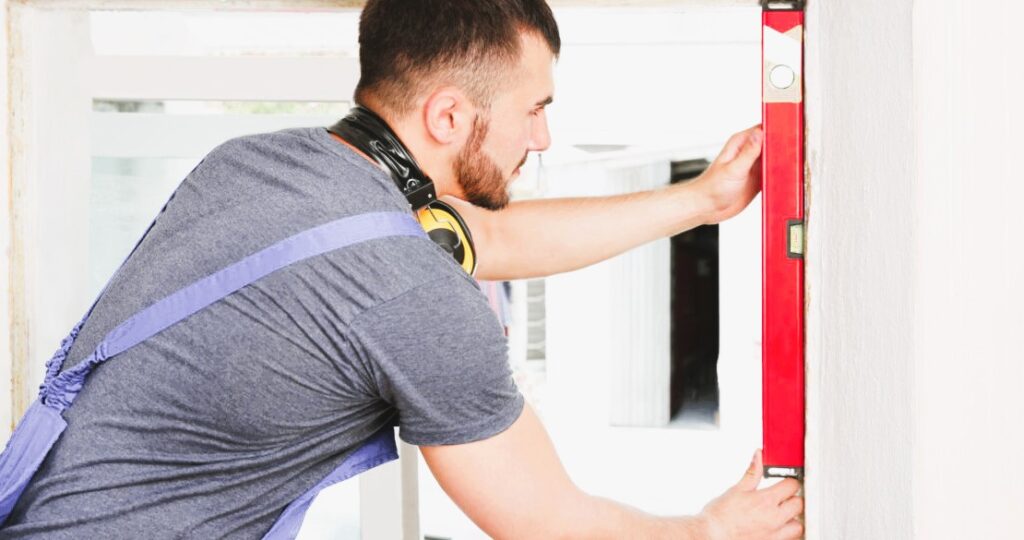 Worker repairing window in flat